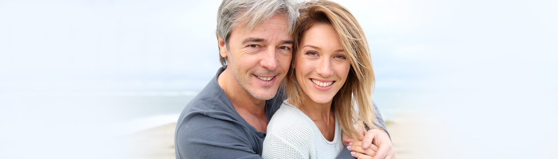 Oral Cancer Screenings Couple with beautiful smile help of Oral Cancer Screening